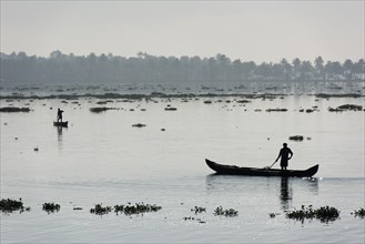 Men in small boats