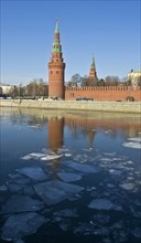 Vodovzvodnaya or Sviblova Tower of Moscow Kremlin and Moskva River with ice floes