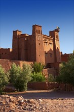 Mud buildings of the fortified Berber Ksar of Ait Benhaddou with a stork's nest