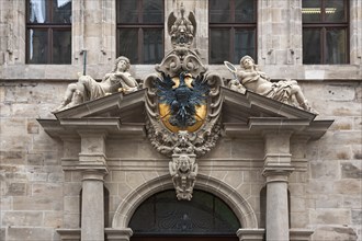 Portal of the west facade with imperial eagle and goddesses