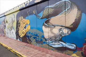 Harbour wall with paintings of marine animals
