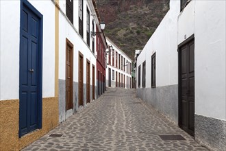 Street with typical houses in the old district of Las Casas