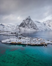Belbe stilt houses at turquoise sea in winter