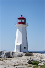 Lighthouse on granite rocks in Peggys Cove