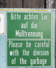 Sign in German and English 'Bitte achten Sie auf die Mulltrennung'