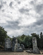 Ruins of the church of Santa Maria di Riscamone against a dramatic sky