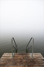 Bathing jetty in the morning fog