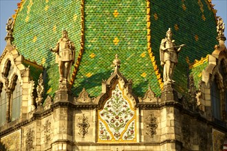 Statues on Zsolnay tiled roof