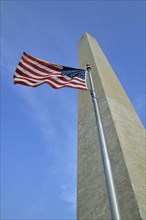 Washington Monument and flag of the United States
