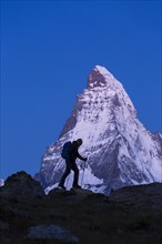The Matterhorn with a hiker