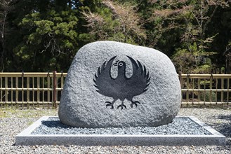 Stone with raven figure