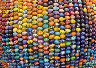 Detail of big sculpture made from many hand painted eggs