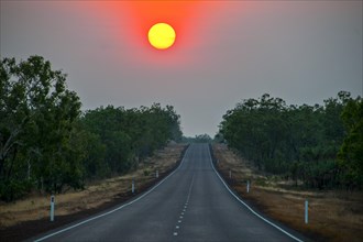 Sunset above a road