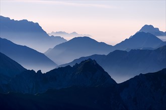 Peaks of the Allgau Alps in steplike arrangement in the early morning