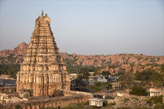 Gopuram of the Virupaksha Temple and the village of Hampi