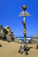 Decorated pole of the hippies in the Valle della Luna