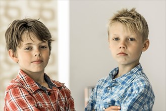 Two boys in plaid shirts