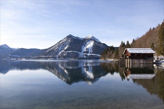 Walchensee or Lake Walchen and Herzogstand mountain in winter