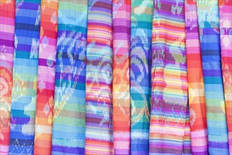 Colourful textiles on display for sale