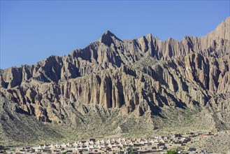 Rugged mountain and a planned settlement