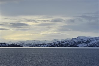 Rocky island landscape at the north sea with cloudy sky