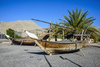 Old dhows in front of Khasab fort