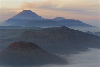 Sunrise over the smoking Gunung Bromo volcano