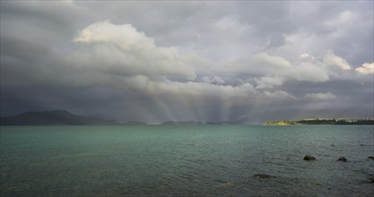 Evening mood with storm clouds above Lago Puyehue