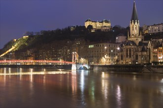 Saint Georges Footbridge and Saint John Cathedral at night, Lyon
