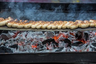Sausages on charcoal grill