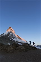 Two mountaineers ascending the Matterhorn
