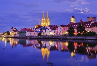 Danube and old town with cathedral at dusk