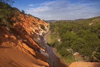 Red sandstone formations of the canyon on Fairy Stream