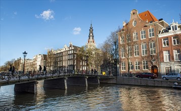 Bridge and historic houses at the Kloveniersburgwal with Zuiderkerk