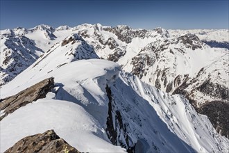 Summit ridge with overhanging snow en route to Mt Laaser Orgelspitze in Val Martello