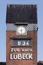 Clock tower with departure indication