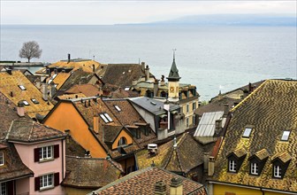 View from the castle over the rooftops of Nyon of Lake Geneva