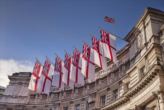 Admiralty Arch flying White Ensigns