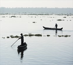 Men in small boats