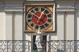 Astronomical clock on the baroque market facade of the town hall
