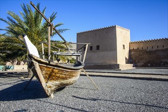 Old dhow in front of Khasab fort