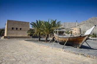 Old dhow in front of Khasab fort