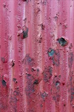 Rusty red corrugated iron sheet