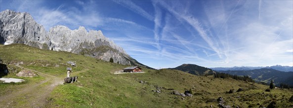 Alpine landscape with mountain mountain hut