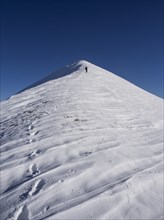 Alpinist climbing Mount Motette