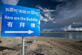 Sign 'Here are the Buddha' at Namtso or Lake Nam