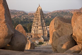 Granite rocks and Gopuram of the Virupaksha Temple