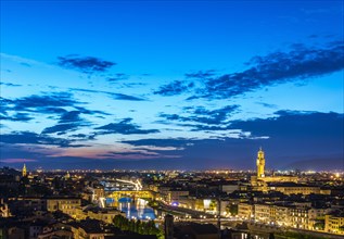 Illuminated city panorama at dusk with Florence Cathedral