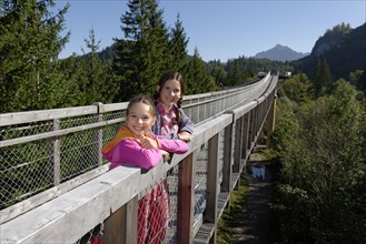 Two girls on the treetop walk