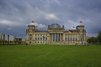 Reichstag building under a cloudy sky